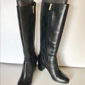 Tall black leather boot. Brand new.